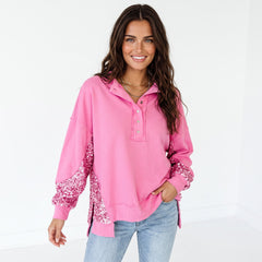 Henley sweatshirt with high and low hem in patchwork of candy sequins