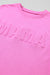 Sudadera relajada de color rosa vivo con letra de mamá en alivio