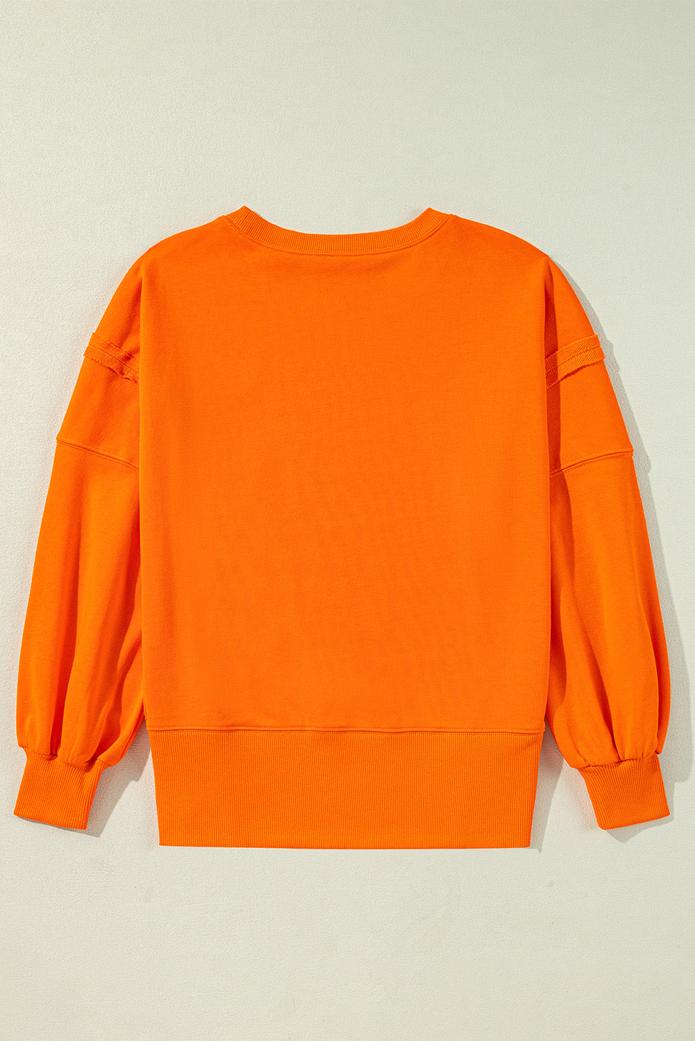 Carrot Exposed Seam Drop Shoulder Round Neck Sweatshirt with Slits