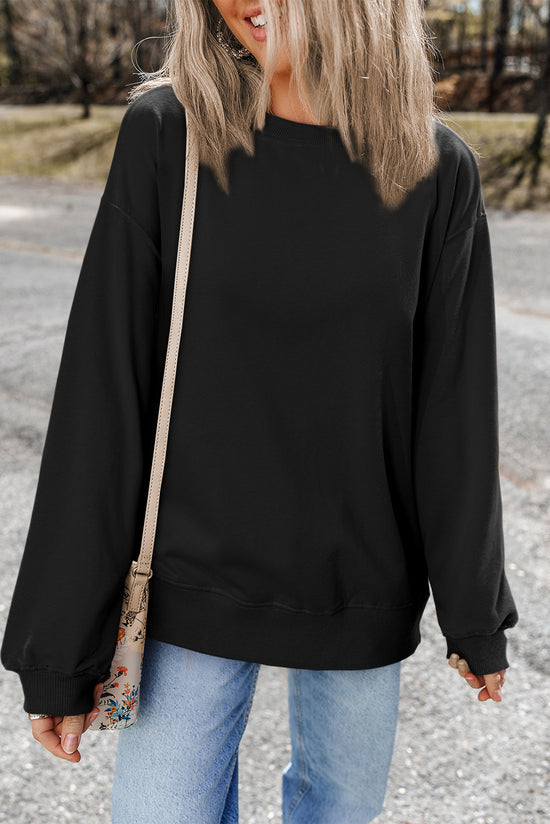 Black solid sweatshirt with dropped shoulders and crew neck