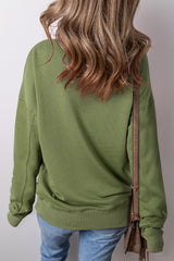 Ample sweatshirt with pockets and crossed seams *