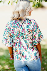 Chemisier bleu clair à imprimé abstrait et manches bouffantes, col montant-A WOMAN WE LOVE