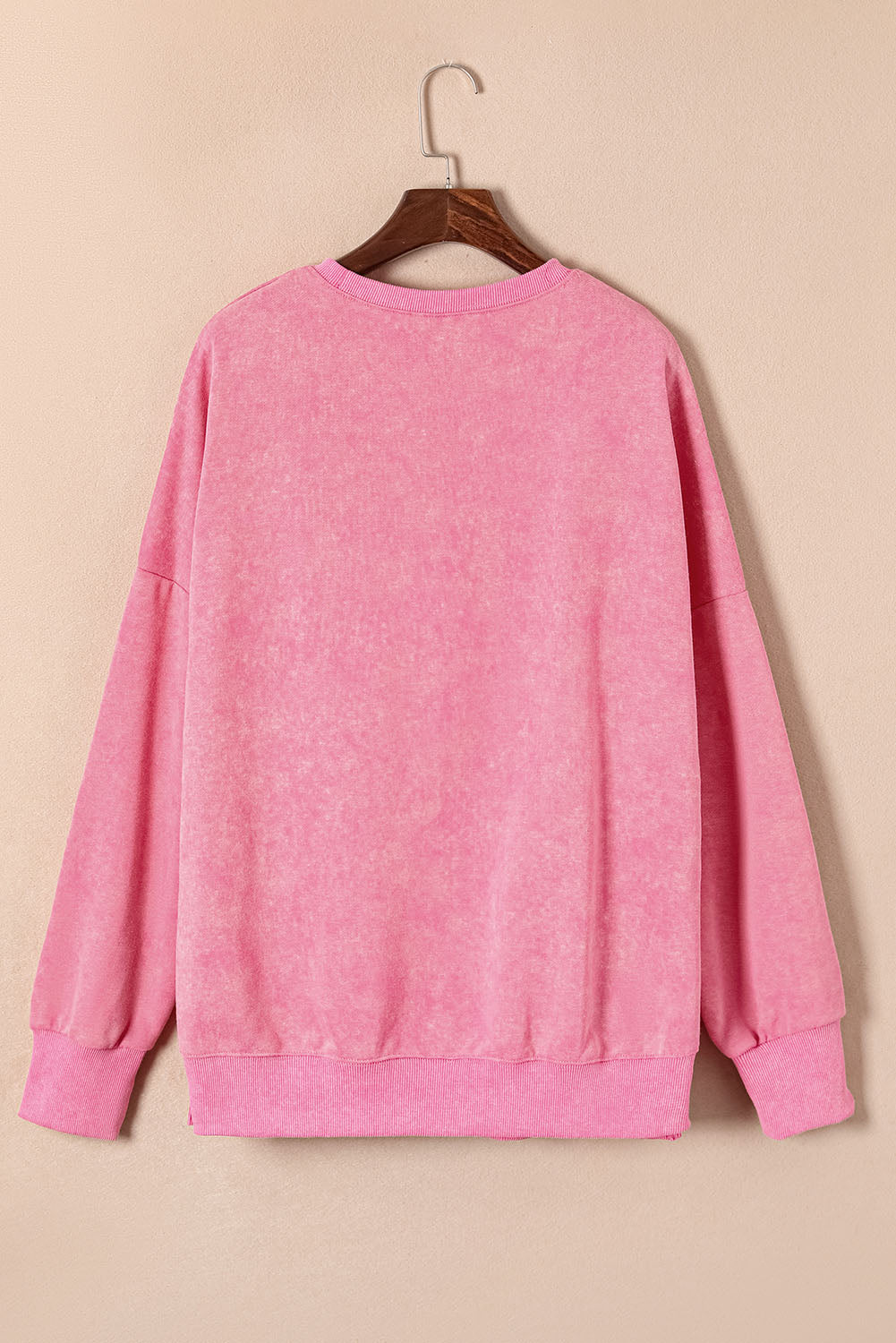 Sudadera rosa rosa con hombro caído y borde acanalado
