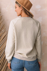 Sudadera beige texturizada une con manga raglán