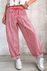 Pantalon ample rayé en coton à cordon et poches
