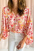 Blusa rosa con pequeñas flores *