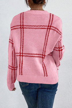 Pull rose à épaules tombantes tricoté à motif écossais*