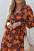 Orange floral print wrap dress with belt