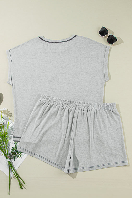 Grey set with cuffed sleeves and contrasting stitching shorts