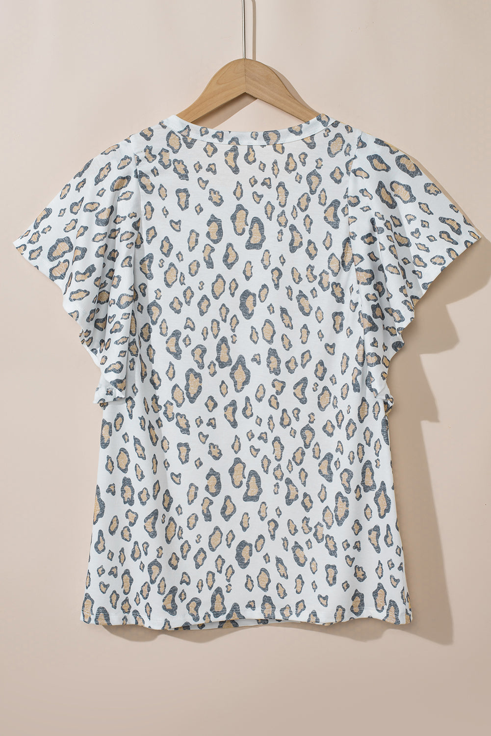Leopardo de estampado alto blanco con mangas de mariposa