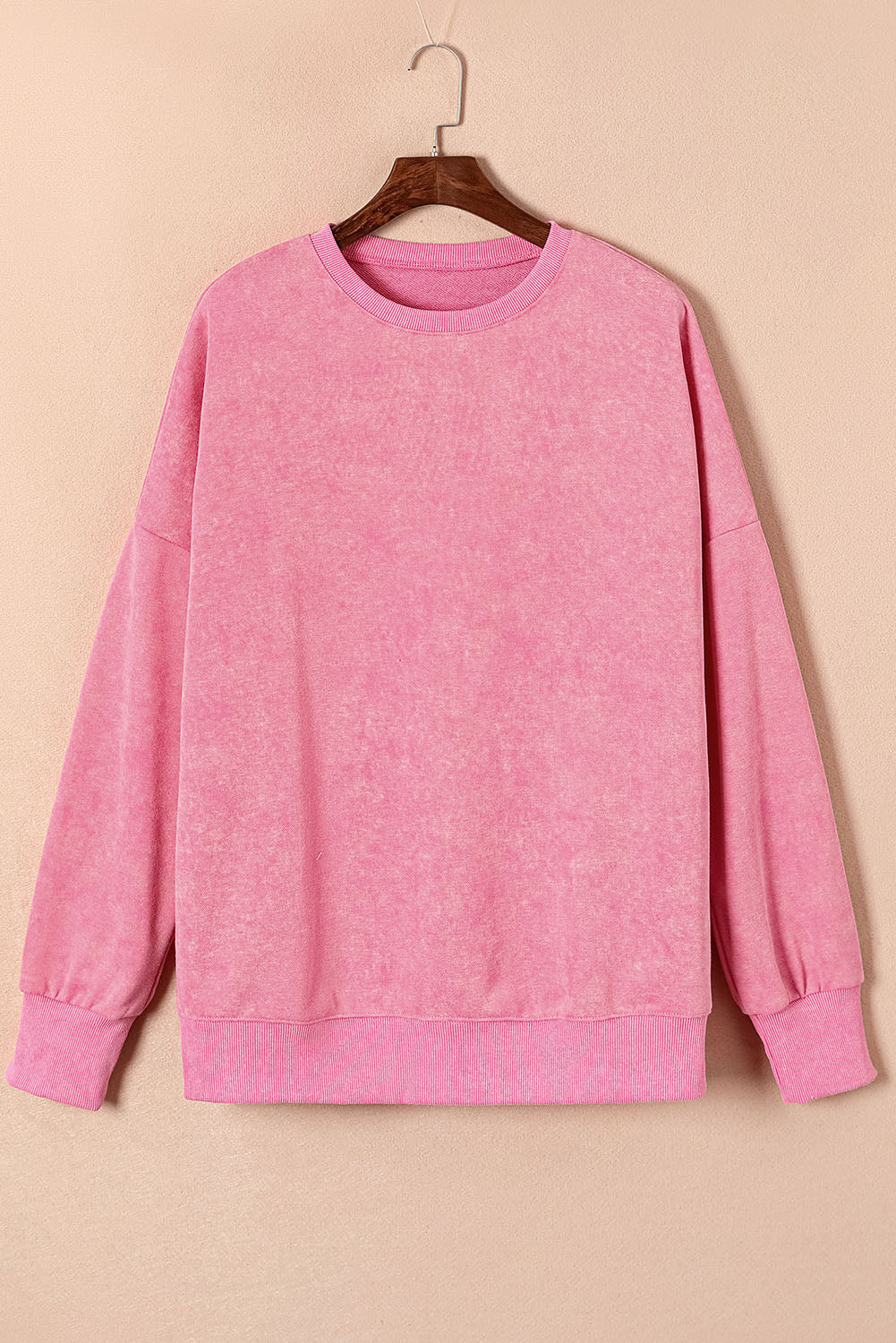 Sudadera rosa rosa con hombro caído y borde acanalado