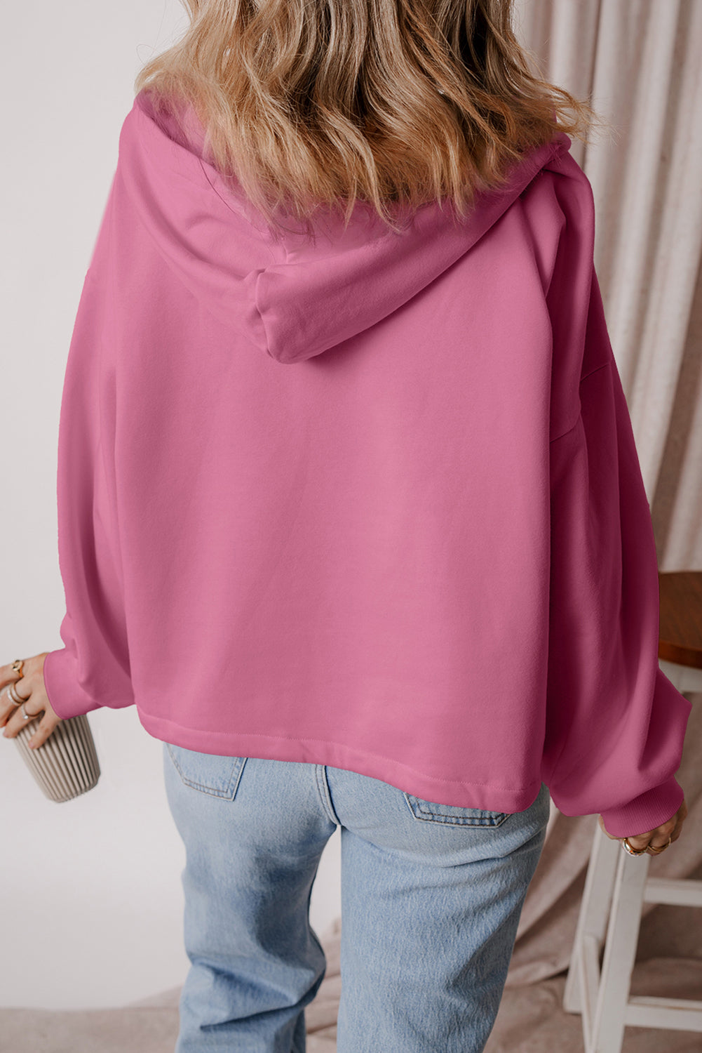 Loose hoodie with kangaroo pockets and half-zip lined with valerian fleece