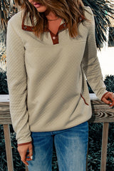 Beige geometric sweatshirt with snap buttons and contrast binding