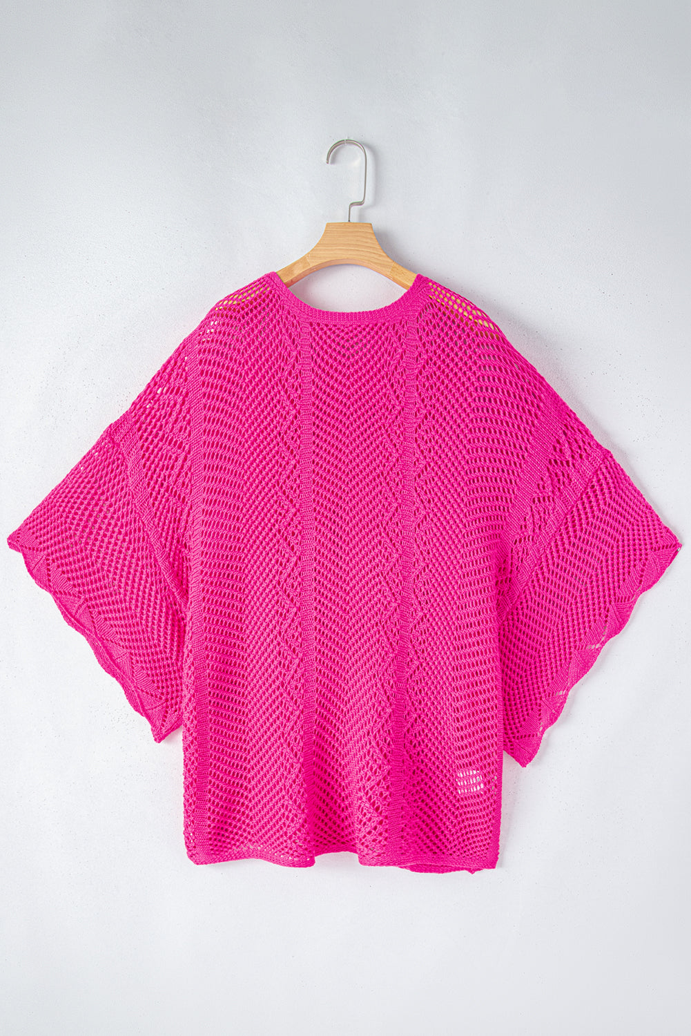 Short -sleeved pink roller -knitting top with scalloped edges