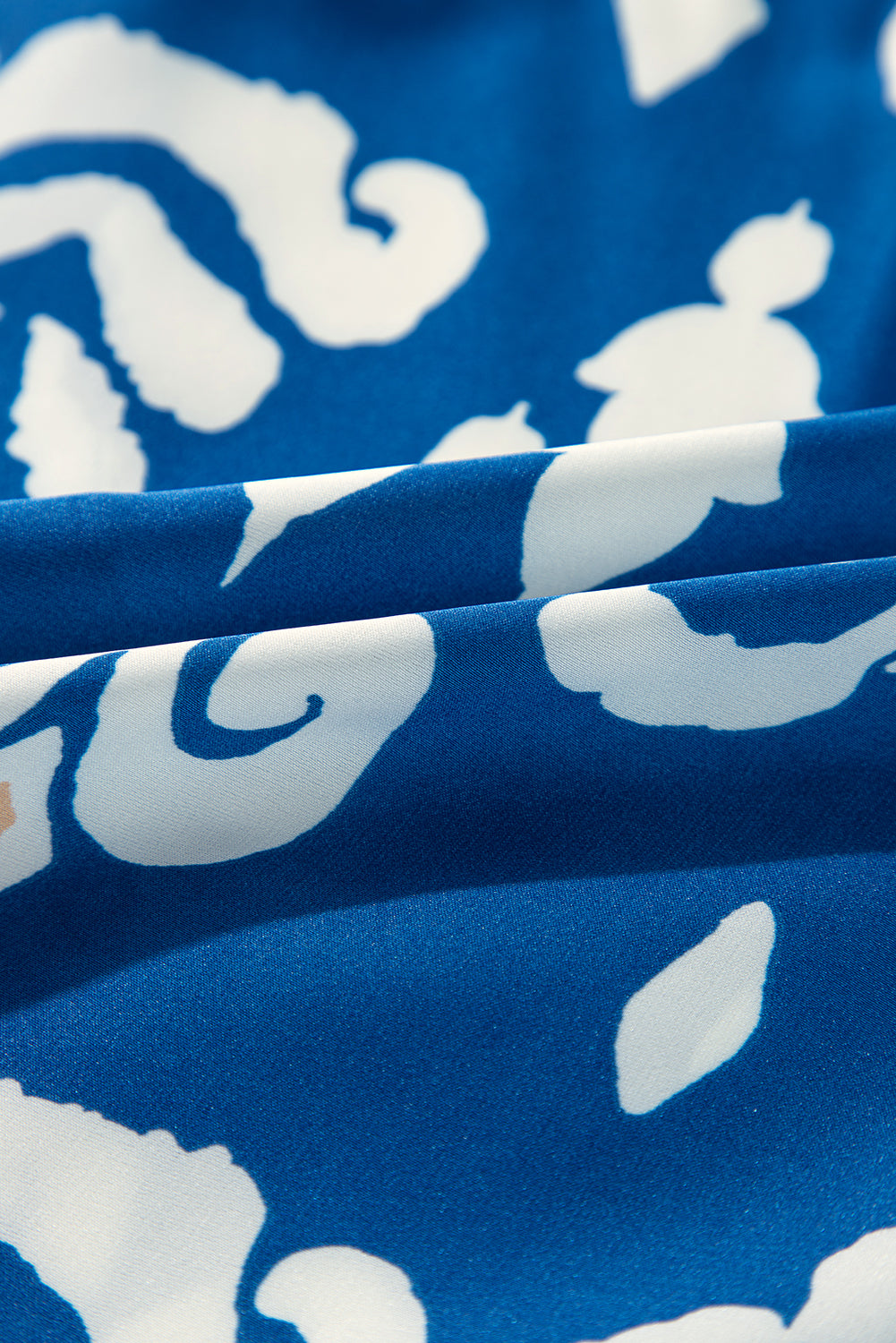 Chemisier coupe fluide à manches 3/4 et imprimé géométrique tribal bleu-A WOMAN WE LOVE