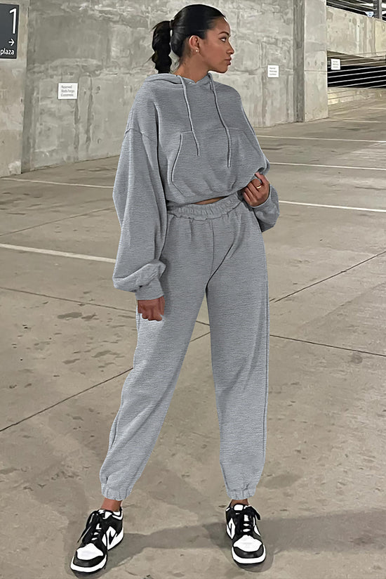 Ensemble de vêtements de sport gris uni avec sweat à capuche et pantalon de jogging à épaules tombantes