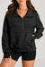 Black sweatshirt with stand-up collar and kangaroo pocket with quarter-turn zip