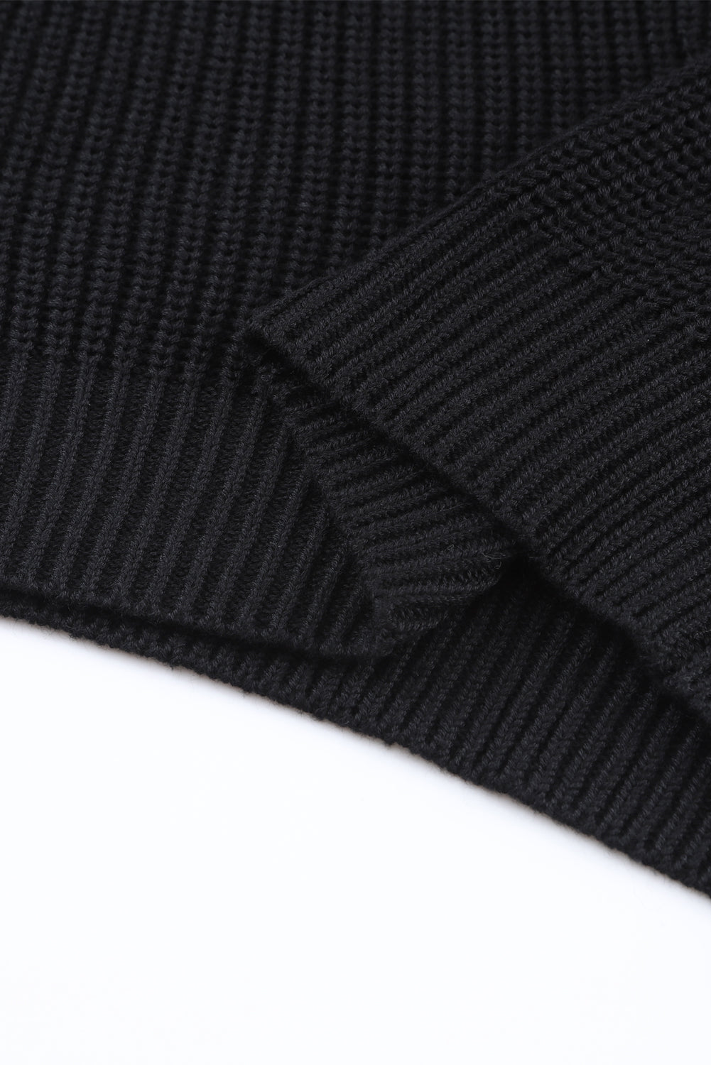 Black sweater in ribbed with V -neck