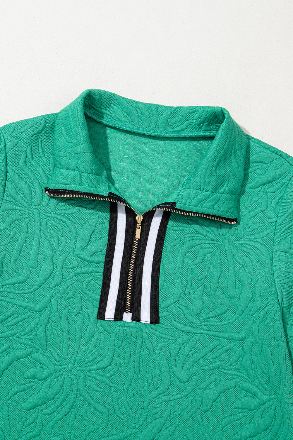 Right mini-Robe in textured jacquard with zipper on a quarter and green of water