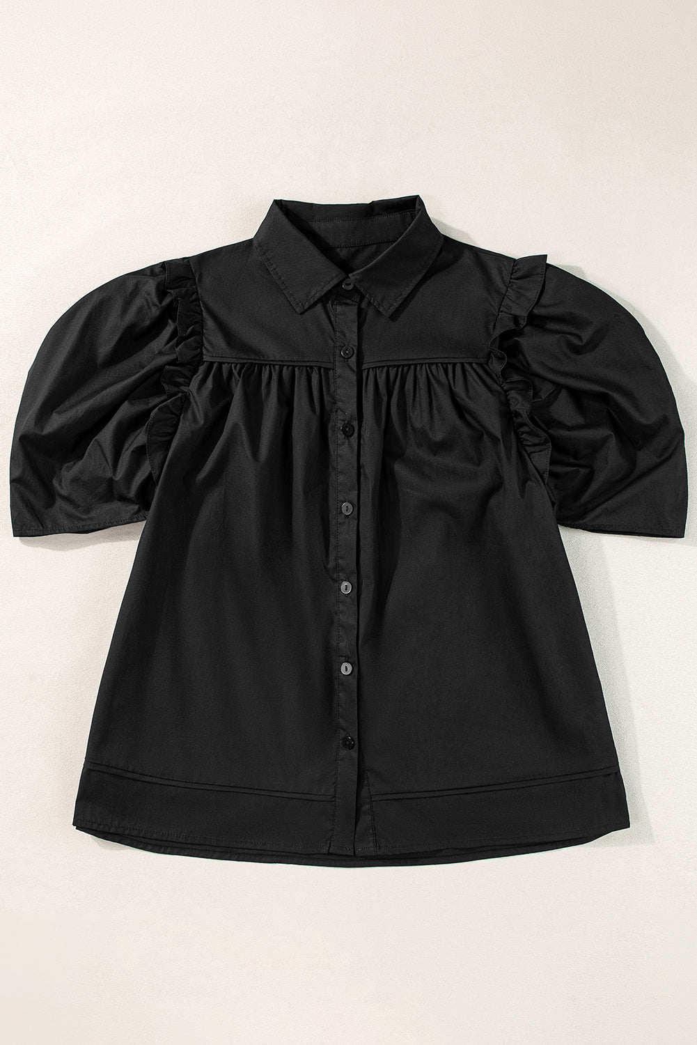 Chemise ample noire à manches bouffantes-A WOMAN WE LOVE