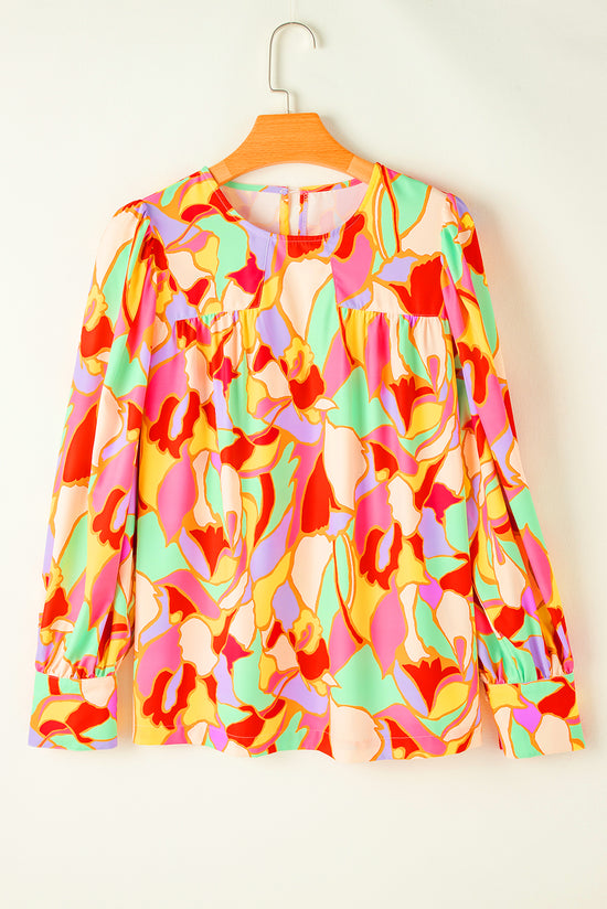 Yellow blouse with puffy sleeves and abstract print