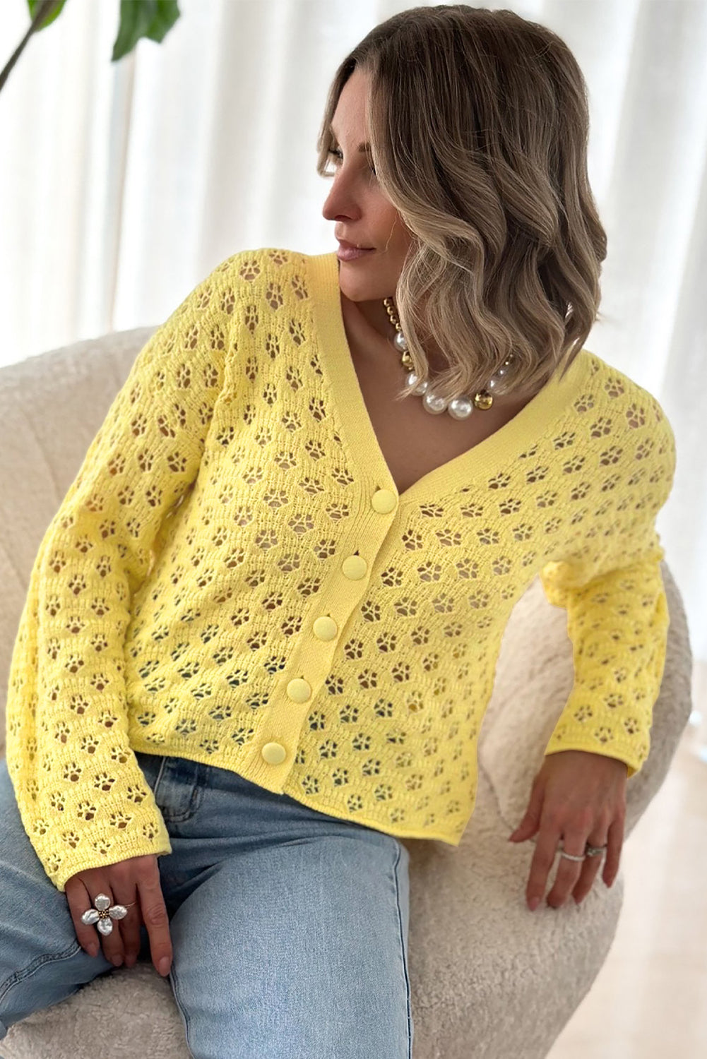 Gelbe Pointeelle Strick gegen Nackenpullover Strickjacke