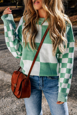 Mint green sweater with dropped shoulders and plaid print