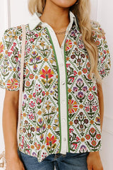 Chemise verte à manches courtes bouffantes et à fleurs