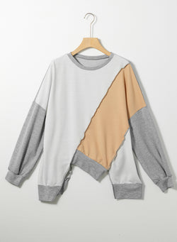 Long sleeve top with irregular hem *