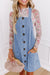 Short denim dress with wide suspenders *