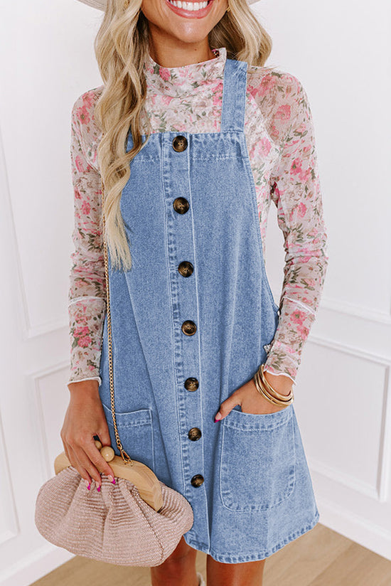 Short denim dress with wide suspenders *