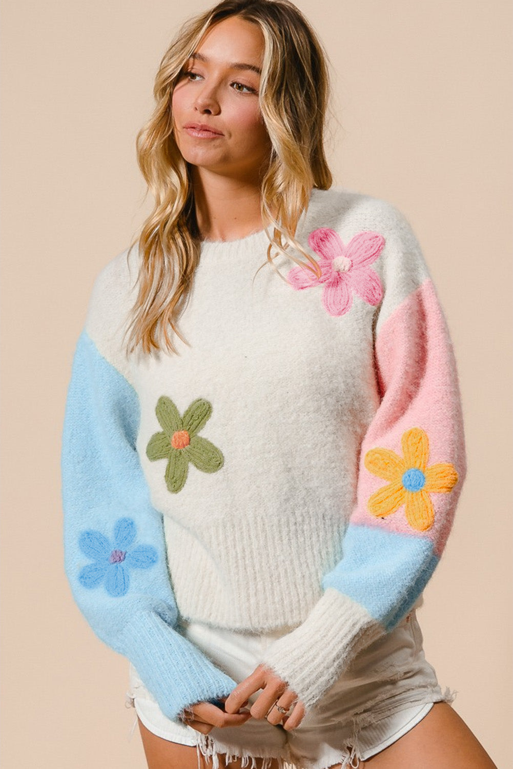 Multicolored sweater with dropped shoulders and multicolored floral embroidery