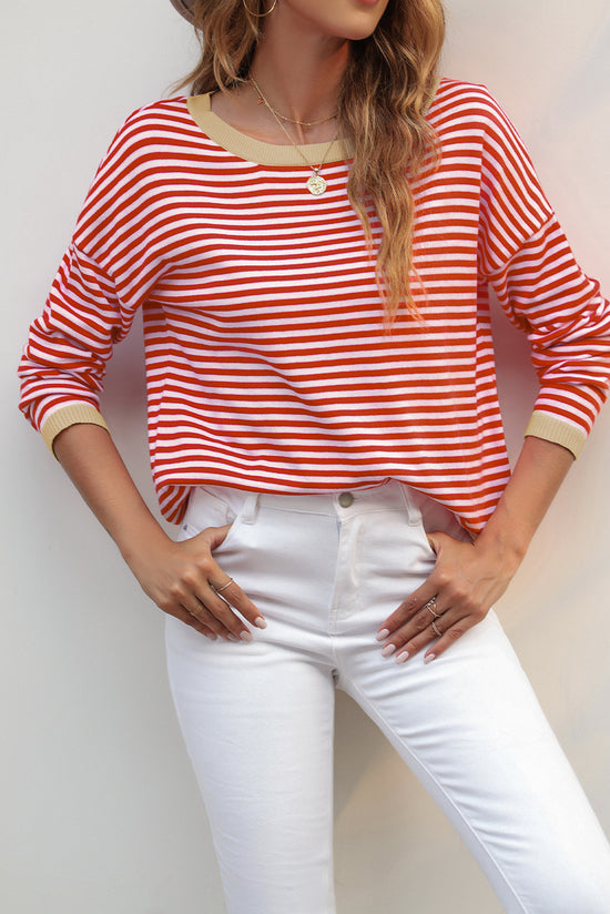 Striped drop shoulder sweater with bright red contrast trim