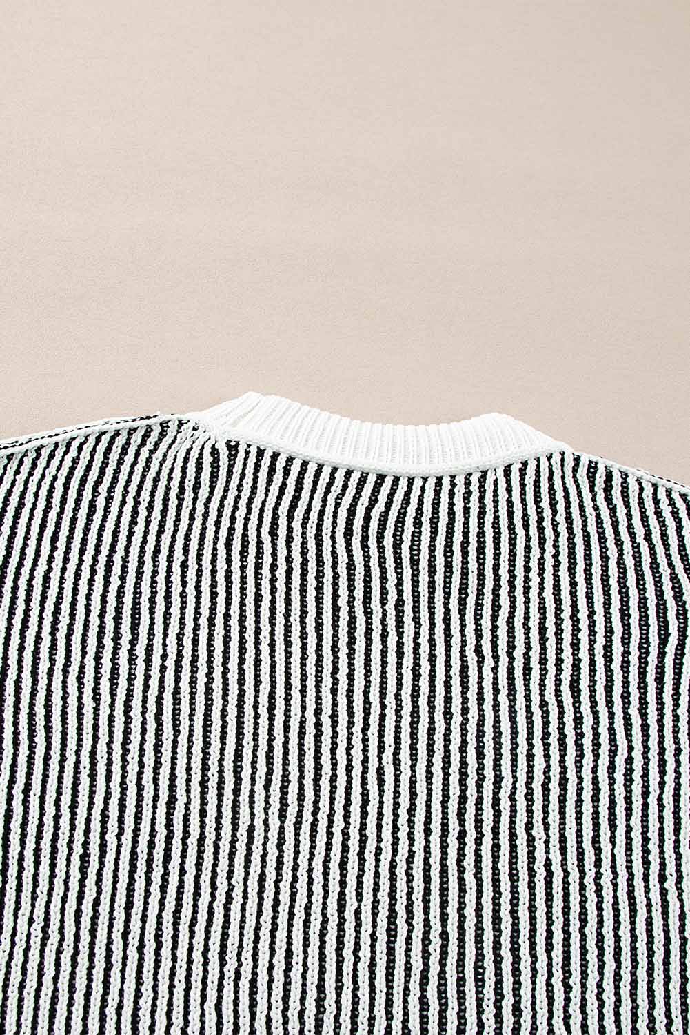 Pull ample à rayures noires en tricot texturé à bords contrastés