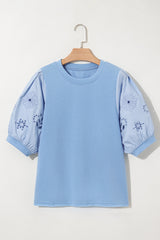 Women's blouse embroidered with puffy sleeves *