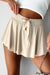 Jupe-short de tennis beige doublée *