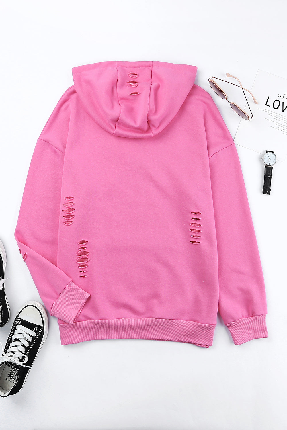 Sweat à capuche déchiré à déchiré solide rose avec poche de kangourou