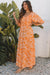 Robe longue smockée à imprimé floral orange*