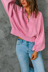 Floated pink sweatshirt with pimples and lantern sleeves