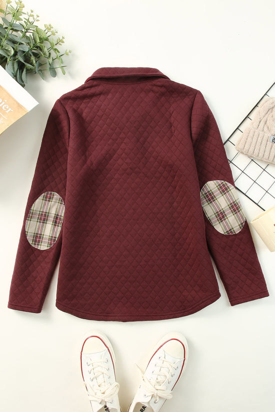 Bright red sweatshirt with geometric texture and plaid trim