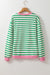 Bright green striped long sleeve top with contrasting edges