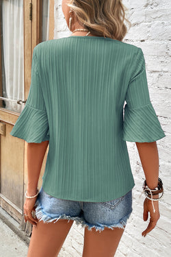 High textured with ruffles and mid-long sleeves *