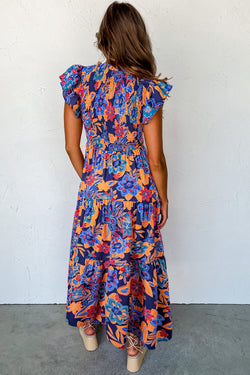 Robe longue bohème florale à col en V et volants à plusieurs niveaux bleu foncé