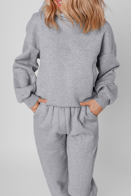 Ensemble de vêtements de sport gris uni à capuche et jogging à coutures apparentes