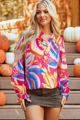 Blouse rose à imprimé abstrait et manches à volants boutonnée à col en V-A WOMAN WE LOVE