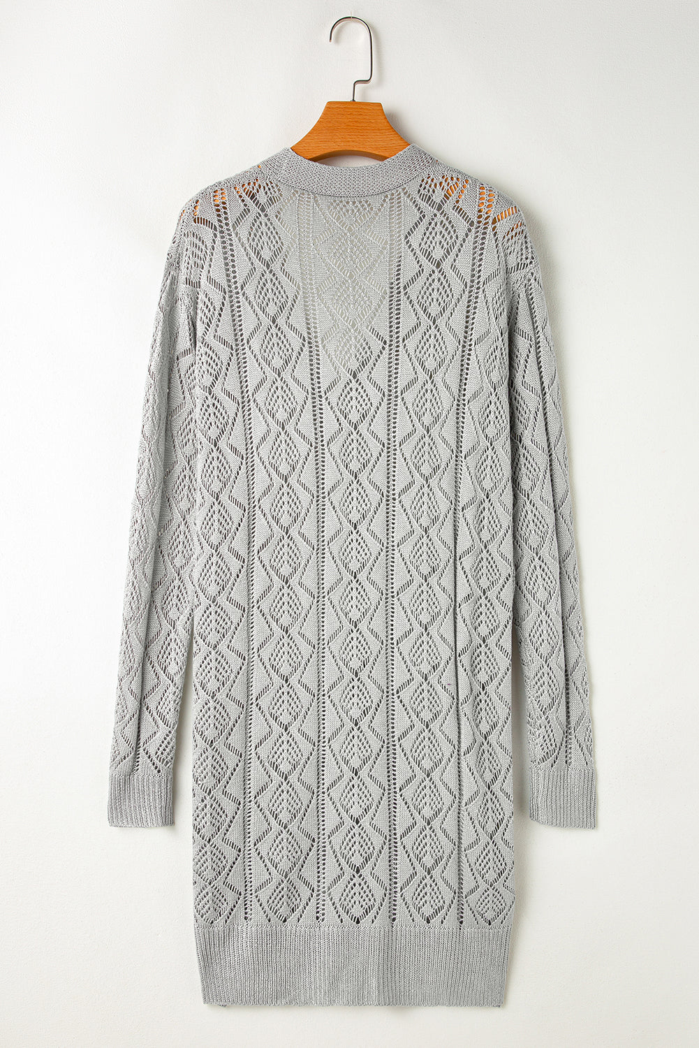 Long gray cardigan with openwork buttons on the front