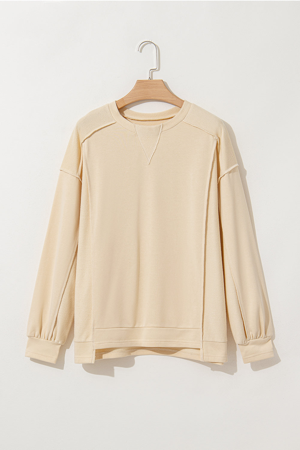 Sweat-shirt beige à col rond et épissage