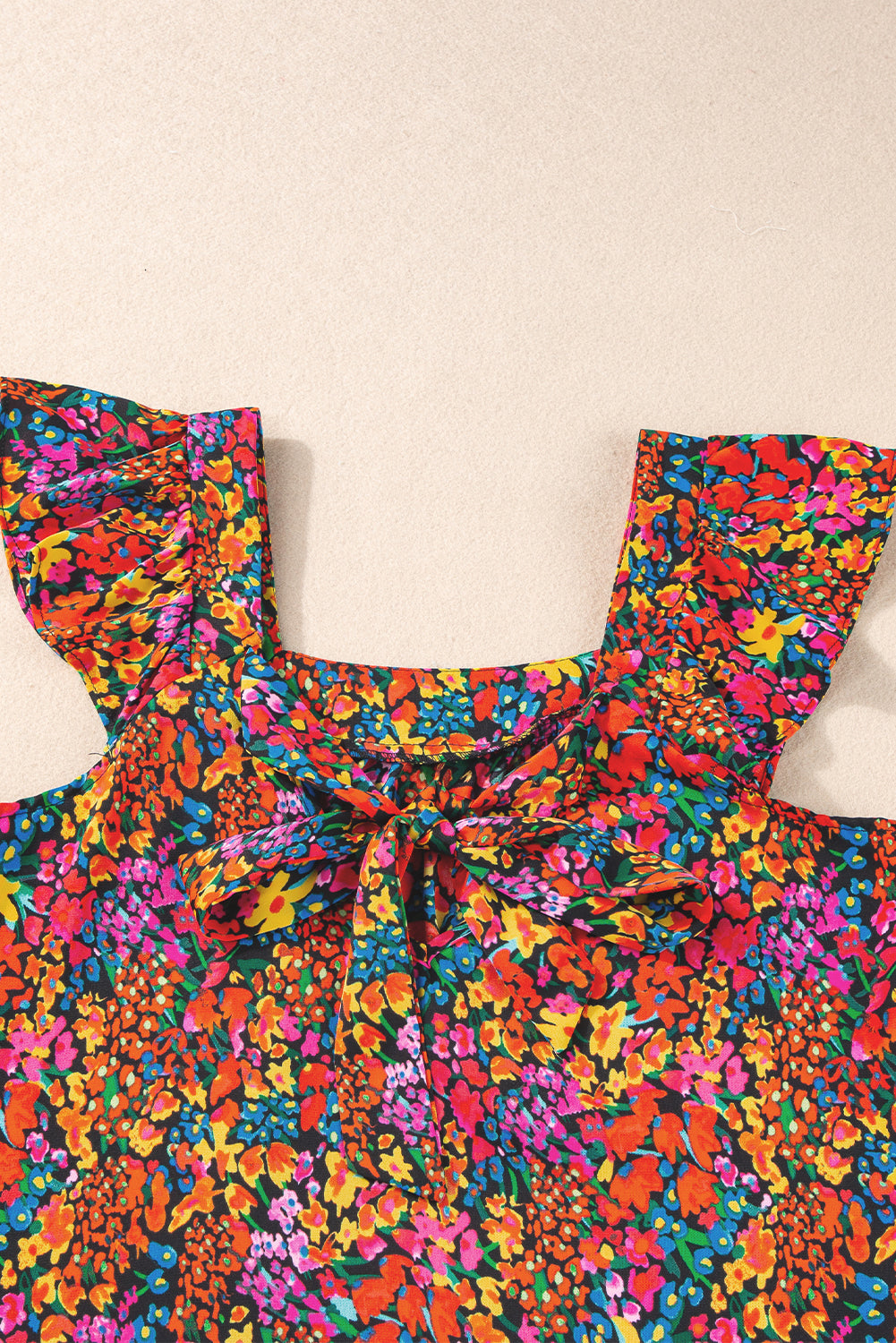 Blusa nodo a tappo a tappo a stampa floreale multicolore