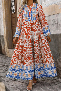 Vestido largo naranja con mangas largas y estampado geométrico boho