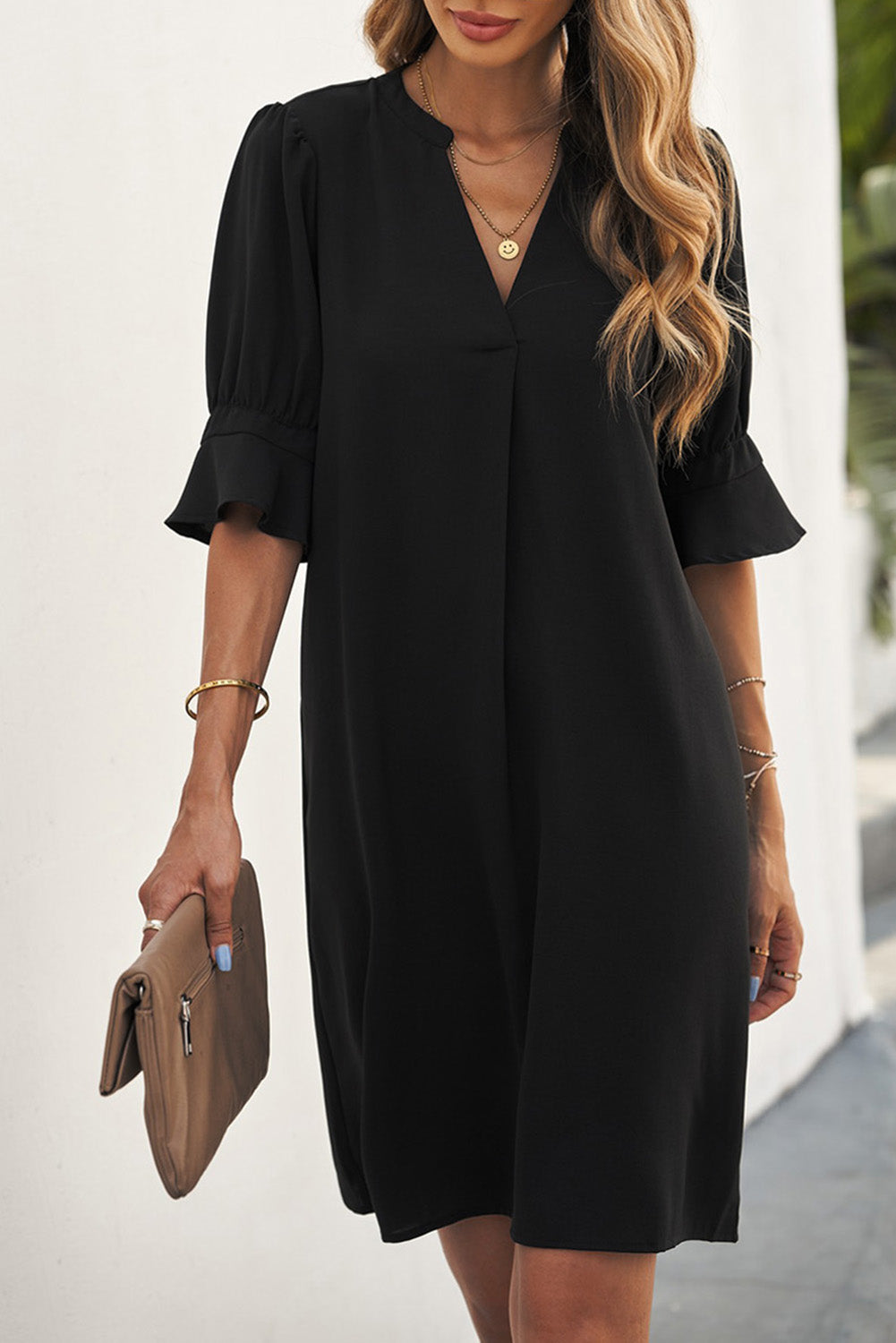 Black straight dress with ruffled sleeves